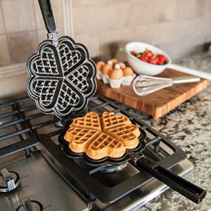 Nordic ware waffle maker on gas stove