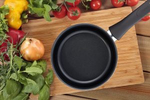 Tefal saucepan cookware on gas stove and other stove tops like electric and ceramic hobs.